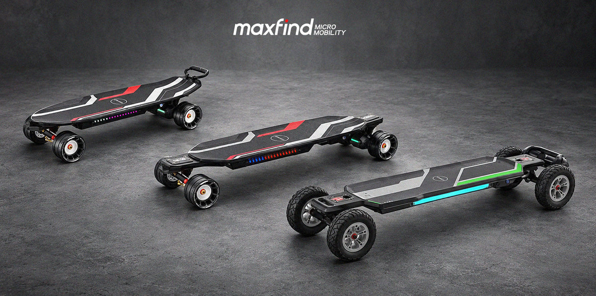 Three MAXFIND electric skateboards displayed on a gray studio floor, including compact, longboard, and all-terrain models.