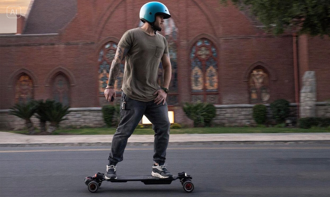 A man on the street using a fast electric skateboard