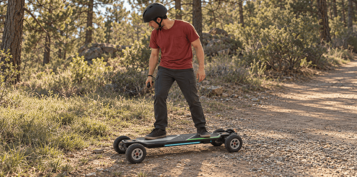 Rider on a stationary Maxfind Cyber Ultra at a junction of packed dirt, gravel, and grass.